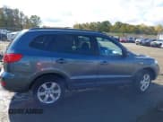 ✅ 2009 Hyundai Santa Fe Limited • VIN: 5NMSH13E09H238247 • Lot: 43574832. Listed on IAAI with 168,143 mi. Free auction sales archive from the USA and detailed vehicle history report at DreamBid. Image 13.