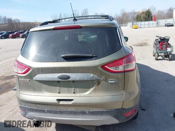 ✅ 2013 Ford Escape SEL • VIN: 1FMCU9HX4DUC34174 • Lot: 41781517. Listed on IAAI with Not provided. Free auction sales archive from the USA and detailed vehicle history report at DreamBid. Image 16.