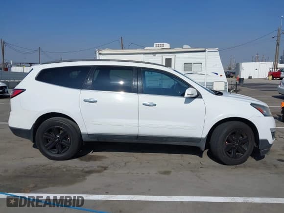 ✅ 2016 Chevrolet Traverse LT • VIN: 1GNKRGKD1GJ133482 • Lot: 43608909. Listed on IAAI with 140,447 mi. Free auction sales archive from the USA and detailed vehicle history report at DreamBid. Image 13.