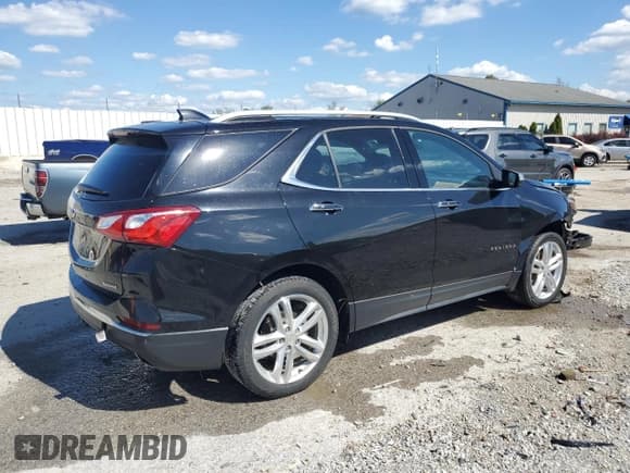 ✅ 2018 Chevrolet Equinox Premier • VIN: 2GNAXNEX6J6319115 • Лот: 84204425. Опубликован ранее на Copart с пробегом 104 712 миль. Бесплатный доступ к архиву аукционных продаж из США и подробный отчёт об истории автомобиля на DreamBid. Изображение 3.