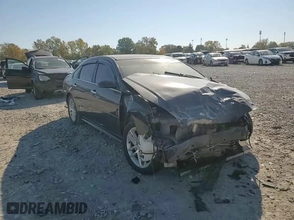 ✅ 2014 Chevrolet Impala LTZ • VIN: 2G1WC5E30E1130320 • Лот: 76473774. Опубликован ранее на Copart с пробегом 95 618 миль. Бесплатный доступ к архиву аукционных продаж из США и подробный отчёт об истории автомобиля на DreamBid. Изображение 10.