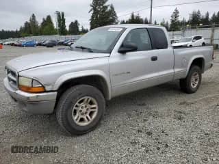 2001 Dodge Dakota Sport with VIN 1B7GG22N21S279553, listed as a Copart auction lot 56994345 with 228,986 mi miles and Clean title. Bid and sale history available at DreamBid. Image 1.