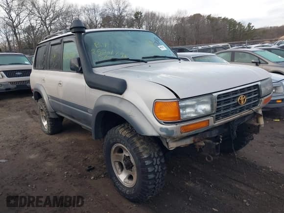 ✅ 1997 Toyota Land Cruiser • VIN: JT3HJ85J8V0180369 • Lot: 41627365. Listed on IAAI with 244,614 mi. Free auction sales archive from the USA and detailed vehicle history report at DreamBid. Image 1.