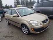 ✅ 2007 Kia Rio LX • VIN: KNADE123676250136 • Lot: 43771987. Wystawiony na IAAI z przebiegiem 164 786 mil. Bezpłatny archiwum sprzedaży aukcyjnych z USA i szczegółowy raport historii pojazdu na DreamBid. Zdjęcie 1.