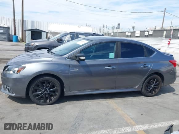 ✅ 2018 Nissan Sentra S • VIN: 3N1AB7AP3JY231696 • Лот: 43056405. Опубликован ранее на IAAI с пробегом 124 253 миль. Бесплатный доступ к архиву аукционных продаж из США и подробный отчёт об истории автомобиля на DreamBid. Изображение 14.