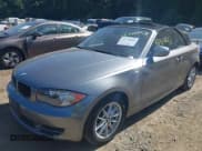 ✅ 2010 BMW 1 Series 128i • VIN: WBAUN1C53AVH81665 • Lot: 42724442. Listed on IAAI with 59,935 mi. Free auction sales archive from the USA and detailed vehicle history report at DreamBid. Image 2.