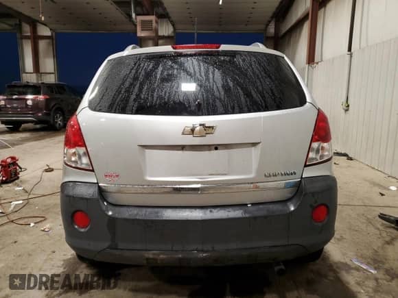 2012 Chevrolet Captiva Sport LS с VIN 3GNAL2EK1CS599075, выставлен на аукционе Copart как лот 84415184 с пробегом 160 365 миль миль и Списание • Salvage title. История ставок и продаж доступна на DreamBid. Изображение 6.