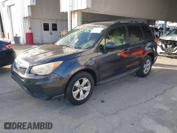 ✅ 2014 Subaru Forester Premium • VIN: JF2SJAEC0EH500152 • Lot: 43634037. Listed on IAAI with 102,945 mi. Free auction sales archive from the USA and detailed vehicle history report at DreamBid. Image 2.