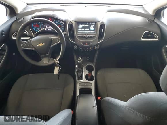 ✅ 2018 Chevrolet Cruze LT • VIN: 1G1BE5SM2J7234472 • Лот: 63101265. Опубликован ранее на Copart с пробегом 124 172 миль. Бесплатный доступ к архиву аукционных продаж из США и подробный отчёт об истории автомобиля на DreamBid. Изображение 8.