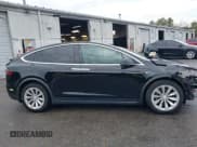 ✅ 2021 Tesla Model X Long Range Plus • VIN: 5YJXCBE27MF324792 • Lot: 41898704. Listed on IAAI with 50,433 mi. Free auction sales archive from the USA and detailed vehicle history report at DreamBid. Image 13.