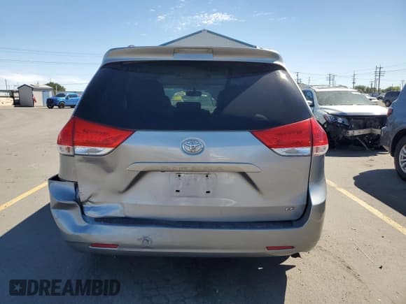✅ 2012 Toyota Sienna LE AAS • VIN: 5TDKK3DC1CS177067 • Lot: 80752135. Listed on Copart with 98,496 mi. Free auction sales archive from the USA and detailed vehicle history report at DreamBid. Image 6.