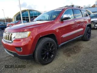 ✅ 2011 Jeep Grand Cherokee Overland • VIN: 1J4RR6GT7BC541784 • Lot: 90932835. Listed on Copart with 125,575 mi. Free auction sales archive from the USA and detailed vehicle history report at DreamBid. Image 1.