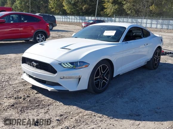 ✅ 2020 Ford Mustang EcoBoost Premium • VIN: 1FA6P8TH3L5120121 • Лот: 43395963. Опубликован ранее на IAAI с пробегом 69 603 миль. Бесплатный доступ к архиву аукционных продаж из США и подробный отчёт об истории автомобиля на DreamBid. Изображение 18.