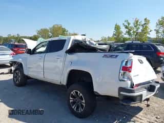 2021 Chevrolet Colorado 4WD Z71 z VIN 1GCGTDEN4M1182075, wystawiony jako IAAI lot #43212161 z przebiegiem 42 053 mil mil oraz . Historia ofert i sprzedaży dostępna na DreamBid. Obrazek 3.