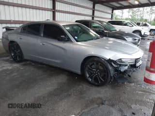 ✅ 2018 Dodge Charger SXT • VIN: 2C3CDXBG4JH206637 • Lot: 42782760. Listed on IAAI with 127,186 mi. Free auction sales archive from the USA and detailed vehicle history report at DreamBid. Image 1.
