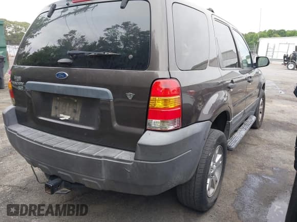 ✅ 2006 Ford Escape XLT • VIN: 1FMCU03116KB98490 • Lot: 42168558. Listed on IAAI with 255,382 mi. Free auction sales archive from the USA and detailed vehicle history report at DreamBid. Image 4.
