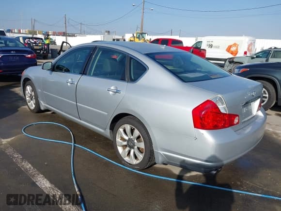 ✅ 2007 Infiniti M • VIN: JNKAY01E57M310931 • Lot: 43839521. Listed on IAAI with 123,207 mi. Free auction sales archive from the USA and detailed vehicle history report at DreamBid. Image 3.