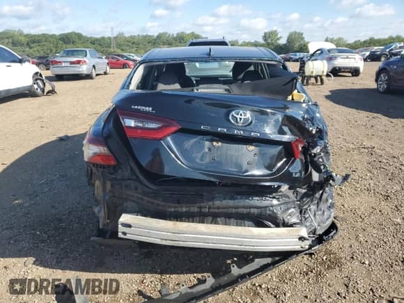 2023 Toyota Camry LE z VIN 4T1C11AK0PU725483, wystawiony jako Copart lot #71720255 z przebiegiem 76 231 mil mil oraz Szkoda całkowita • Salvage title. Historia ofert i sprzedaży dostępna na DreamBid. Obrazek 6.