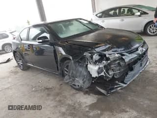 ✅ 2015 Scion tC • VIN: JTKJF5C70FJ012718 • Lot: 43747586. Listed on IAAI with 68,588 mi. Free auction sales archive from the USA and detailed vehicle history report at DreamBid. Image 1.