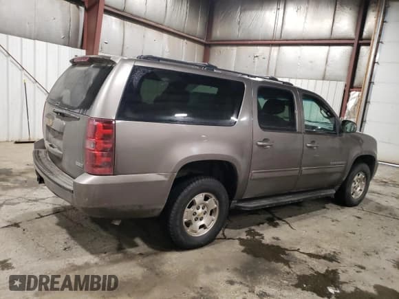 ✅ 2011 Chevrolet Suburban LS • VIN: 1GNSKHE33BR296058 • Lot: 42045125. Listed on Copart with 218,708 mi. Free auction sales archive from the USA and detailed vehicle history report at DreamBid. Image 3.