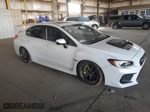 ✅ 2018 Subaru WRX STI Limited • VIN: JF1VA2W64J9811734 • Lot: 63633825. Listed on Copart with 52,767 mi. Free auction sales archive from the USA and detailed vehicle history report at DreamBid. Image 4.