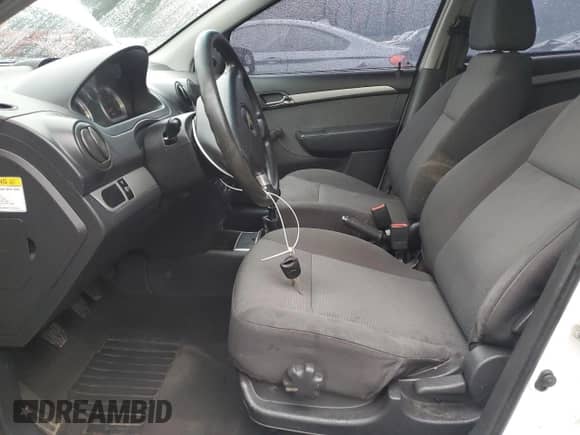 2009 Chevrolet Aveo 1LT z VIN KL1TD56E29B382736, wystawiony jako Copart lot #87038674 z przebiegiem 177 623 mil mil oraz Szkoda całkowita • Salvage title. Historia ofert i sprzedaży dostępna na DreamBid. Obrazek 7.