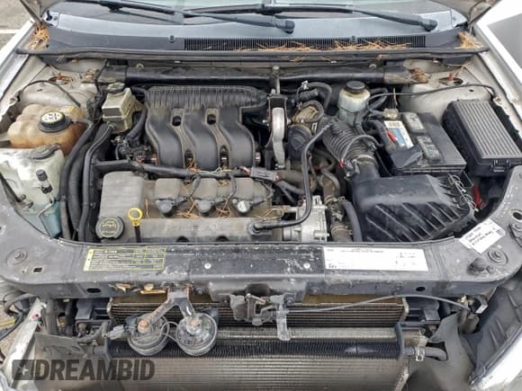 ✅ 2005 Ford Five Hundred SE • VIN: 1FAFP23165G144727 • Lot: 93308475. Wystawiony na Copart z przebiegiem 118 061 mil. Bezpłatny archiwum sprzedaży aukcyjnych z USA i szczegółowy raport historii pojazdu na DreamBid. Zdjęcie 11.