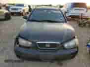 2003 Hyundai Elantra GLS z VIN KMHDN45D53U572664, wystawiony jako Copart lot #82387214 z przebiegiem Nie podano mil oraz Szkoda całkowita • Salvage title. Historia ofert i sprzedaży dostępna na DreamBid. Obrazek 5.