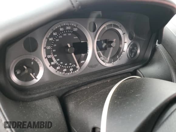 ✅ 2013 Aston Martin Vantage • VIN: SCFEKBAK4DGC17340 • Lot: 85629734. Listed on Copart with 34,975 mi. Free auction sales archive from the USA and detailed vehicle history report at DreamBid. Image 9.