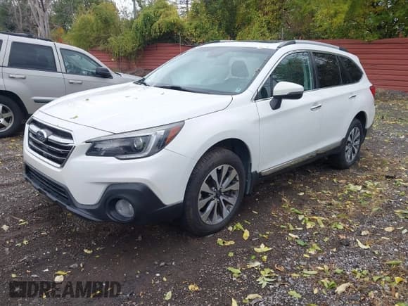 ✅ 2018 Subaru Outback Touring • VIN: 4S4BSATC5J3296837 • Лот: 43499333. Опубликован ранее на IAAI с пробегом 100 098 миль. Бесплатный доступ к архиву аукционных продаж из США и подробный отчёт об истории автомобиля на DreamBid. Изображение 2.