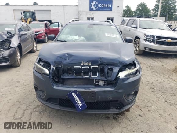 ✅ 2020 Jeep Cherokee Altitude • VIN: 1C4PJMLX0LD512883 • Lot: 61228625. Wystawiony na Copart z przebiegiem 31 088 mil. Bezpłatny archiwum sprzedaży aukcyjnych z USA i szczegółowy raport historii pojazdu na DreamBid. Zdjęcie 5.
