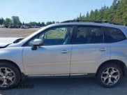 ✅ 2016 Subaru Forester Touring • VIN: JF2SJAXC4GH564016 • Lot: 42408444. Listed on IAAI with 34,506 mi. Free auction sales archive from the USA and detailed vehicle history report at DreamBid. Image 14.