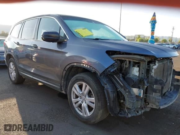 ✅ 2018 Honda Pilot LX • VIN: 5FNYF5H17JB033169 • Lot: 43343804. Listed on IAAI with 198,965 mi. Free auction sales archive from the USA and detailed vehicle history report at DreamBid. Image 1.