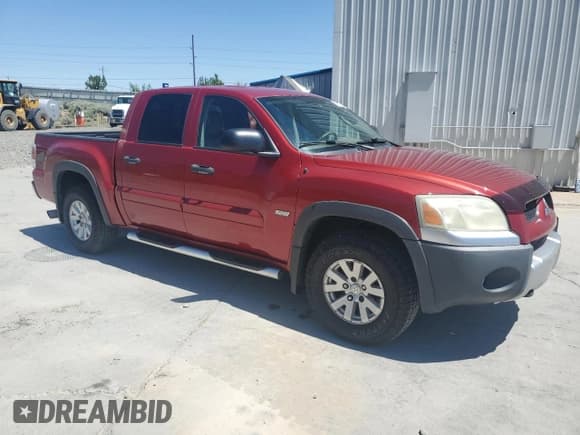 ✅ 2006 Mitsubishi Raider • VIN: 1Z7HT38K36S538243 • Lot: 60665335. Listed on Copart with 184,772 mi. Free auction sales archive from the USA and detailed vehicle history report at DreamBid. Image 4.