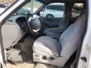 ✅ 1997 Ford F-150 • VIN: 1FTDX0766VKA86983 • Lot: 50896215. Listed on Copart with 214,746 mi. Free auction sales archive from the USA and detailed vehicle history report at DreamBid. Image 7.