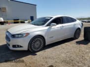 ✅ 2013 Ford Fusion Titanium Hybrid • VIN: 3FA6P0RU3DR291973 • Лот: 82748155. Опубликован ранее на Copart с пробегом Не указан. Бесплатный доступ к архиву аукционных продаж из США и подробный отчёт об истории автомобиля на DreamBid. Изображение 1.