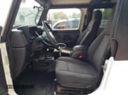 ✅ 2006 Jeep Wrangler Unlimited LWB • VIN: 1J4FA44S66P710265 • Lot: 67661105. Wystawiony na Copart z przebiegiem 151 206 mil. Bezpłatny archiwum sprzedaży aukcyjnych z USA i szczegółowy raport historii pojazdu na DreamBid. Zdjęcie 7.