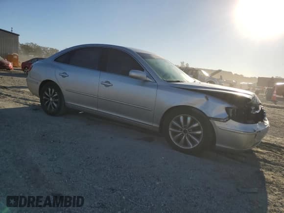 ✅ 2007 Hyundai Azera SE • VIN: KMHFC46F27A206456 • Lot: 82639615. Listed on Copart with 153,231 mi. Free auction sales archive from the USA and detailed vehicle history report at DreamBid. Image 4.