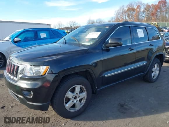 ✅ 2011 Jeep Grand Cherokee Laredo • VIN: 1J4RR4GG7BC510252 • Lot: 43727718. Listed on IAAI with 179,626 mi. Free auction sales archive from the USA and detailed vehicle history report at DreamBid. Image 2.