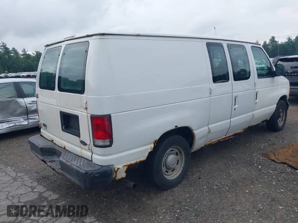 ✅ 2005 Ford Econoline Cargo • VIN: 1FTRE14W45HA28566 • Lot: 42875904. Listed on IAAI with 216,247 mi. Free auction sales archive from the USA and detailed vehicle history report at DreamBid. Image 4.