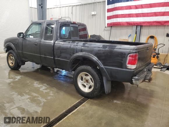 ✅ 2000 Ford Ranger XLT • VIN: 1FTZR15X4YTB28390 • Lot: 64061415. Listed on Copart with 165,592 mi. Free auction sales archive from the USA and detailed vehicle history report at DreamBid. Image 2.