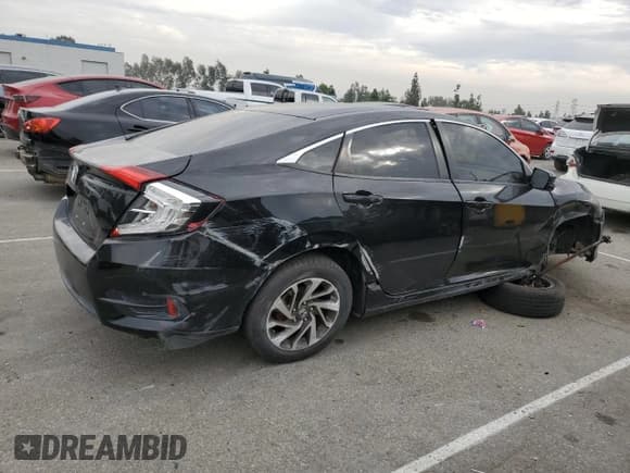 ✅ 2016 Honda Civic EX • VIN: 19XFC2F75GE064649 • Лот: 92680265. Опубликован ранее на Copart с пробегом 143 196 миль. Бесплатный доступ к архиву аукционных продаж из США и подробный отчёт об истории автомобиля на DreamBid. Изображение 3.