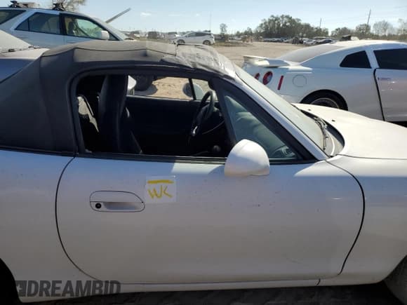 ✅ 2002 Mazda MX-5 Miata Cloth • VIN: JM1NB353X20222049 • Лот: 75404914. Опубликован ранее на Copart с пробегом Не указан. Бесплатный доступ к архиву аукционных продаж из США и подробный отчёт об истории автомобиля на DreamBid. Изображение 12.