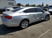 ✅ 2017 Chevrolet Impala Premier • VIN: 1G1145S37HU184220 • Lot: 80649765. Listed on Copart with 99,590 mi. Free auction sales archive from the USA and detailed vehicle history report at DreamBid. Image 3.