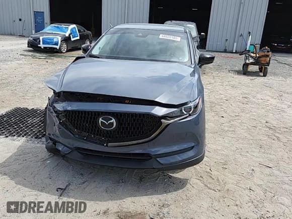 ✅ 2021 Mazda CX-5 Carbon Edition • VIN: JM3KFACM1M0395301 • Lot: 68020185. Wystawiony na Copart z przebiegiem 48 623 mil. Bezpłatny archiwum sprzedaży aukcyjnych z USA i szczegółowy raport historii pojazdu na DreamBid. Zdjęcie 14.