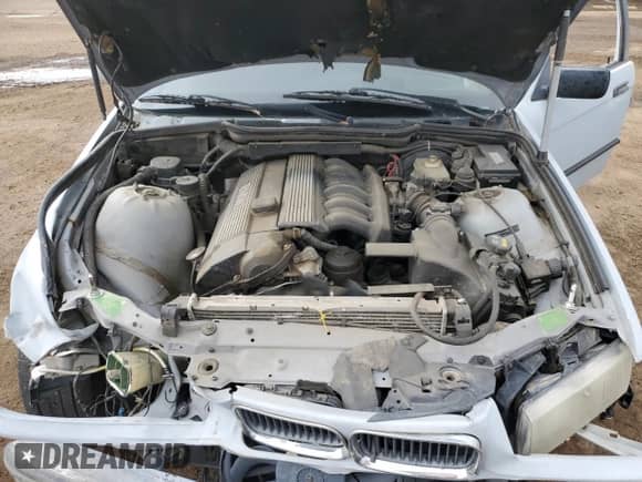 1998 BMW 3 Series z VIN WBACD3328WAV23184, wystawiony jako Copart lot #58570555 z przebiegiem 181 087 mil mil oraz Szkoda całkowita • Salvage title. Historia ofert i sprzedaży dostępna na DreamBid. Obrazek 11.