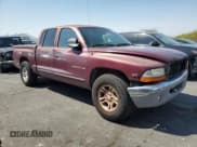 ✅ 2000 Dodge Dakota Sport • VIN: 1B7GL2AN4YS720364 • Lot: 68598355. Listed on Copart with 264,504 mi. Free auction sales archive from the USA and detailed vehicle history report at DreamBid. Image 4.