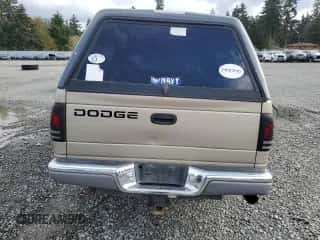 2002 Dodge Dakota SLT с VIN 1B7HL48N02S607590, выставлен на аукционе Copart как лот 78642324 с пробегом 209 081 миль миль и Списание • Salvage title. История ставок и продаж доступна на DreamBid. Изображение 6.