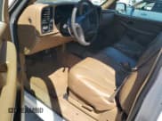 ✅ 1999 GMC Sierra 1500 SLE • VIN: 1GTEK14TXXZ502630 • Лот: 57312095. Опубликован ранее на Copart с пробегом 74 699 миль. Бесплатный доступ к архиву аукционных продаж из США и подробный отчёт об истории автомобиля на DreamBid. Изображение 8.