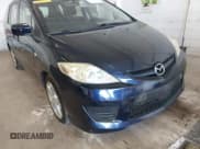 ✅ 2009 Mazda 5 Touring • VIN: JM1CR29L990334150 • Lot: 42395807. Wystawiony na IAAI z przebiegiem 95 412 mil. Bezpłatny archiwum sprzedaży aukcyjnych z USA i szczegółowy raport historii pojazdu na DreamBid. Zdjęcie 6.